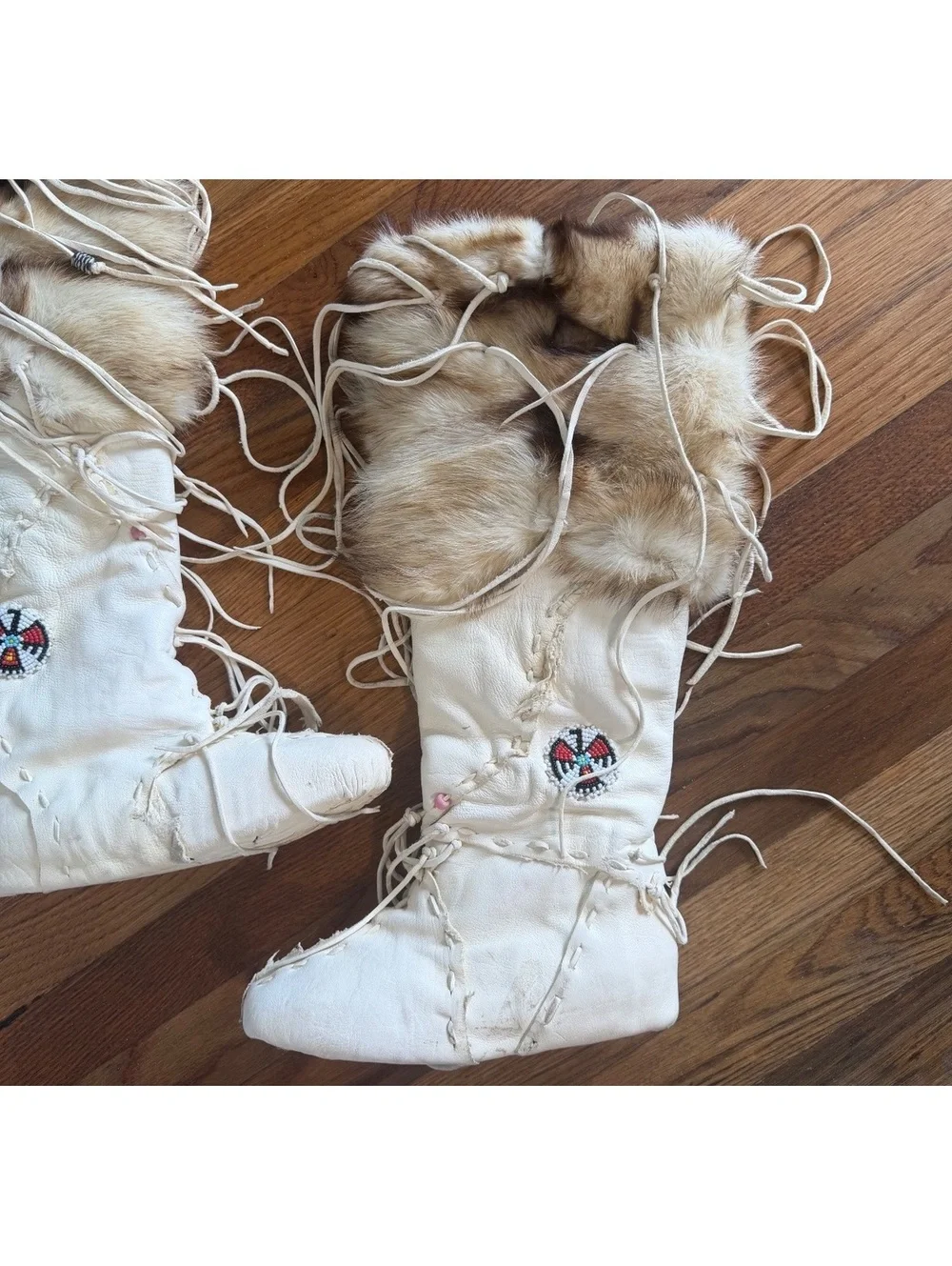 Handcrafted White Leather and Fur Moccasin Boots with Beaded Design